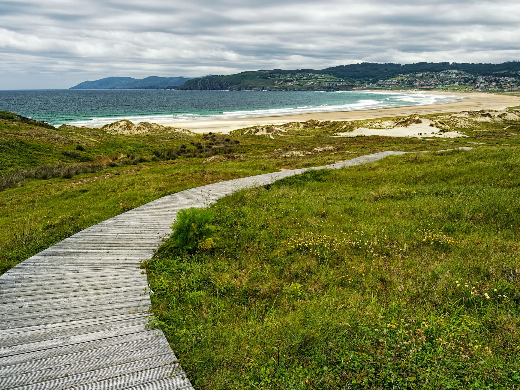 Boardwalk through the dunes to the beach, Galicia
