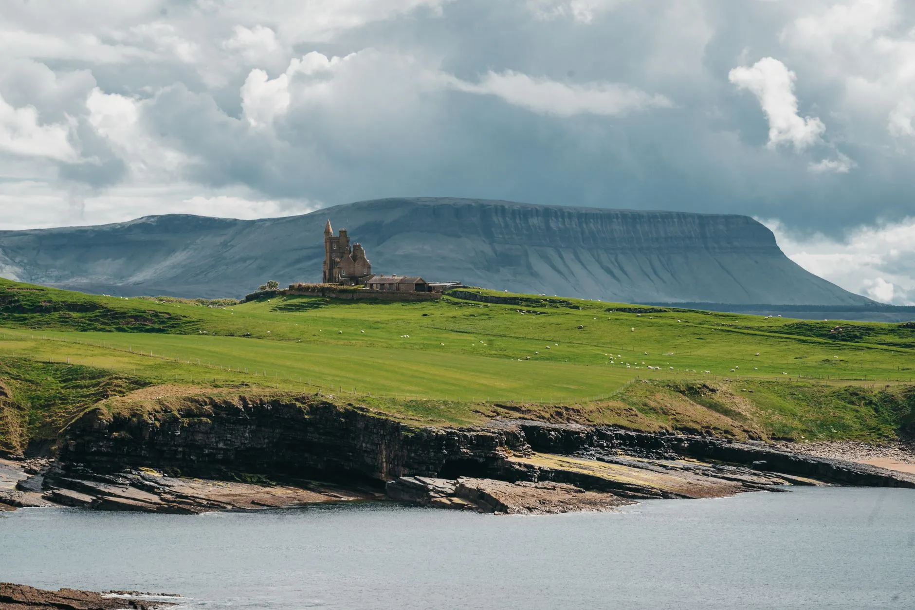 Classiebawn Castle and Benbulben from the Mullaghmore headland, County Sligo
