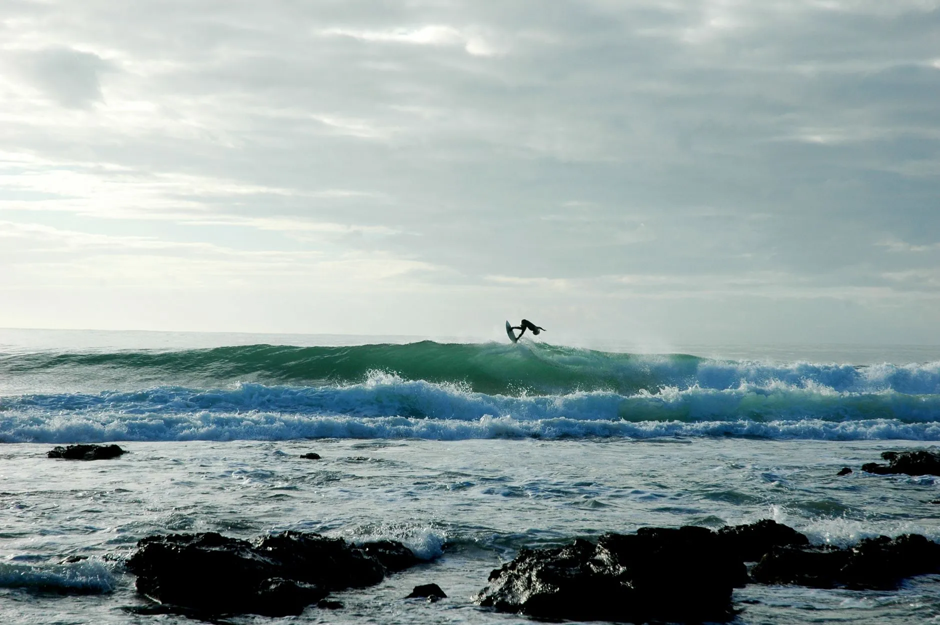 A wall stands up over the reef at Jeffreys Bay