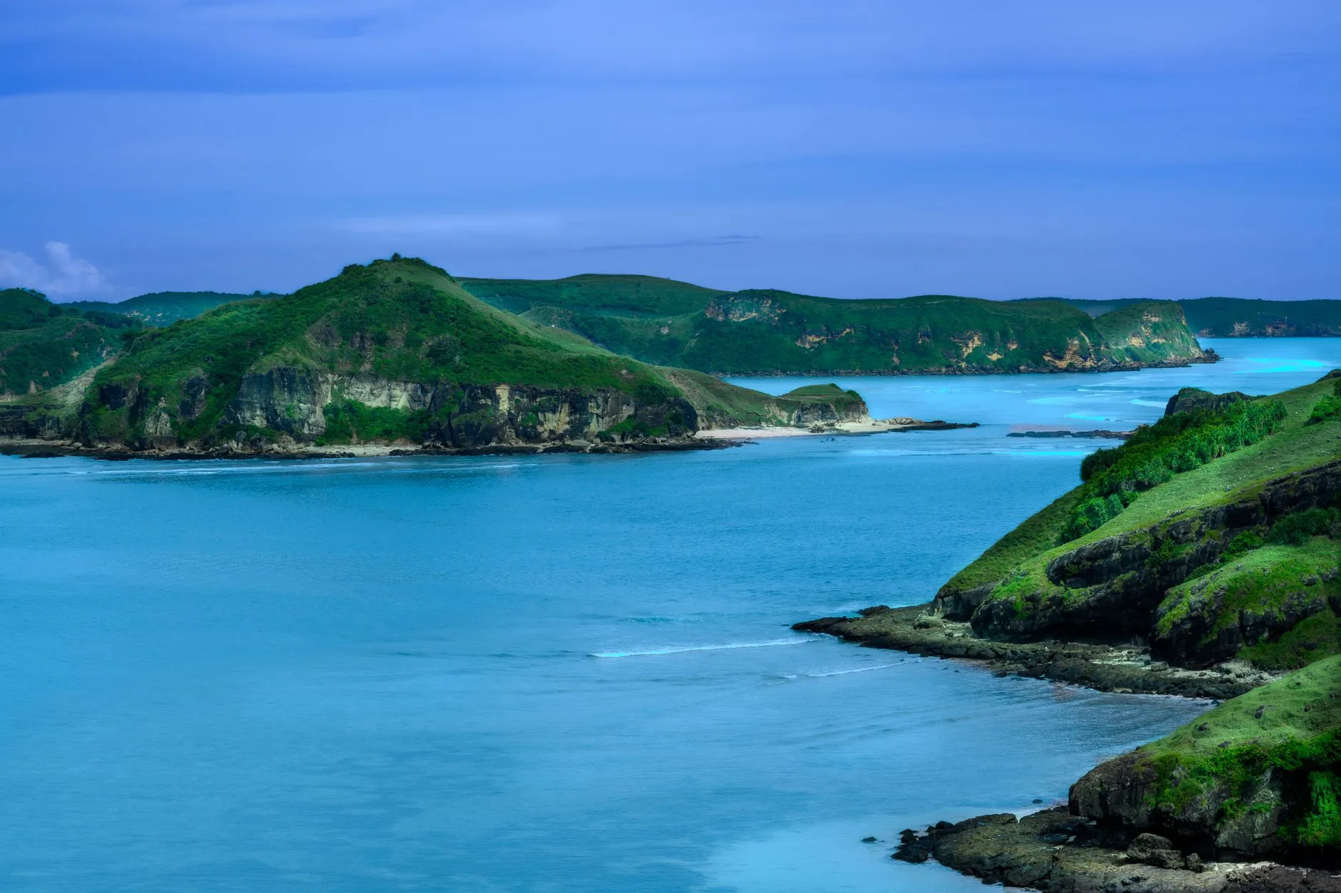 Green headlands and turquoise bays on Lombok's south coast