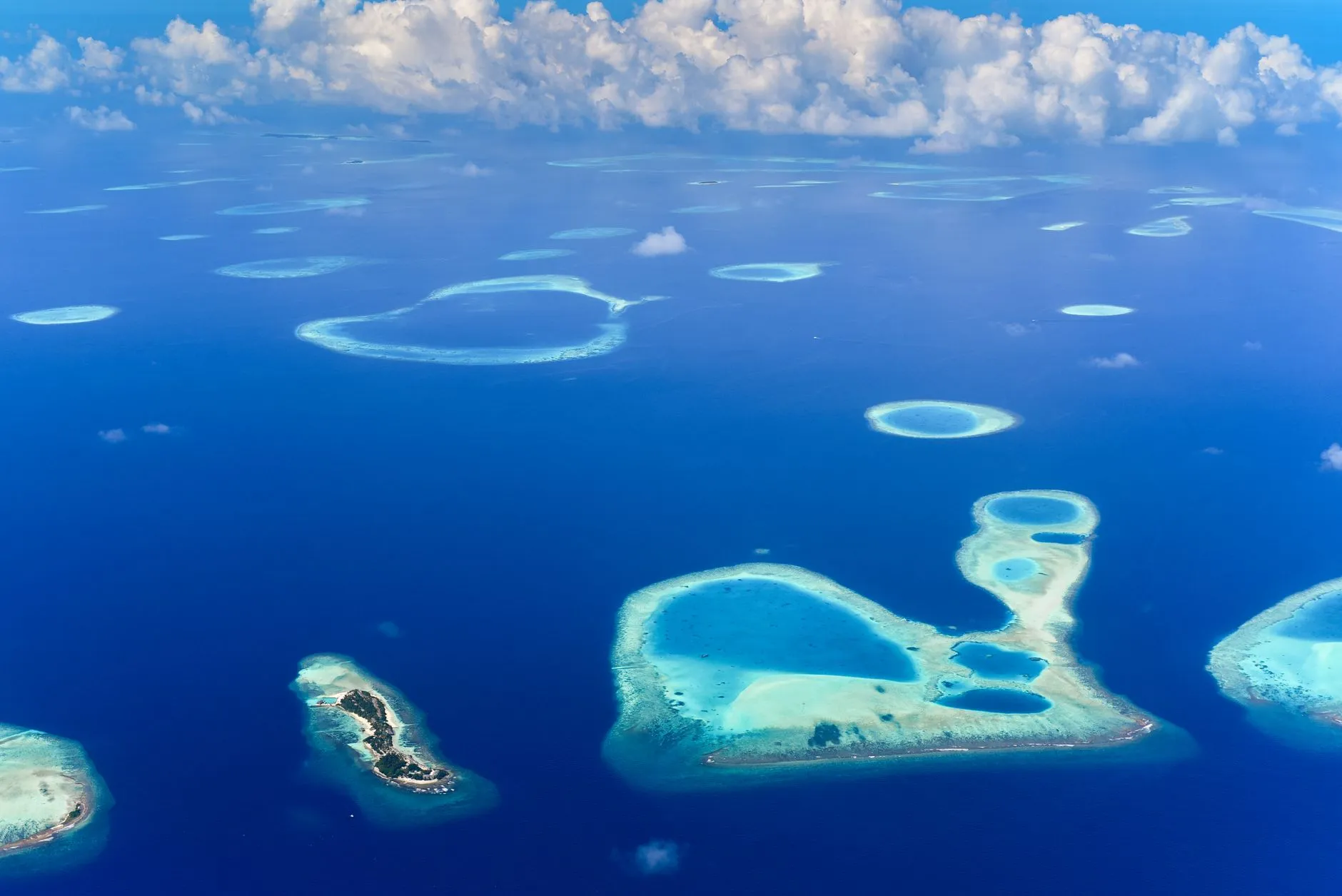 Reef rings from the seaplane: a country that is one percent land