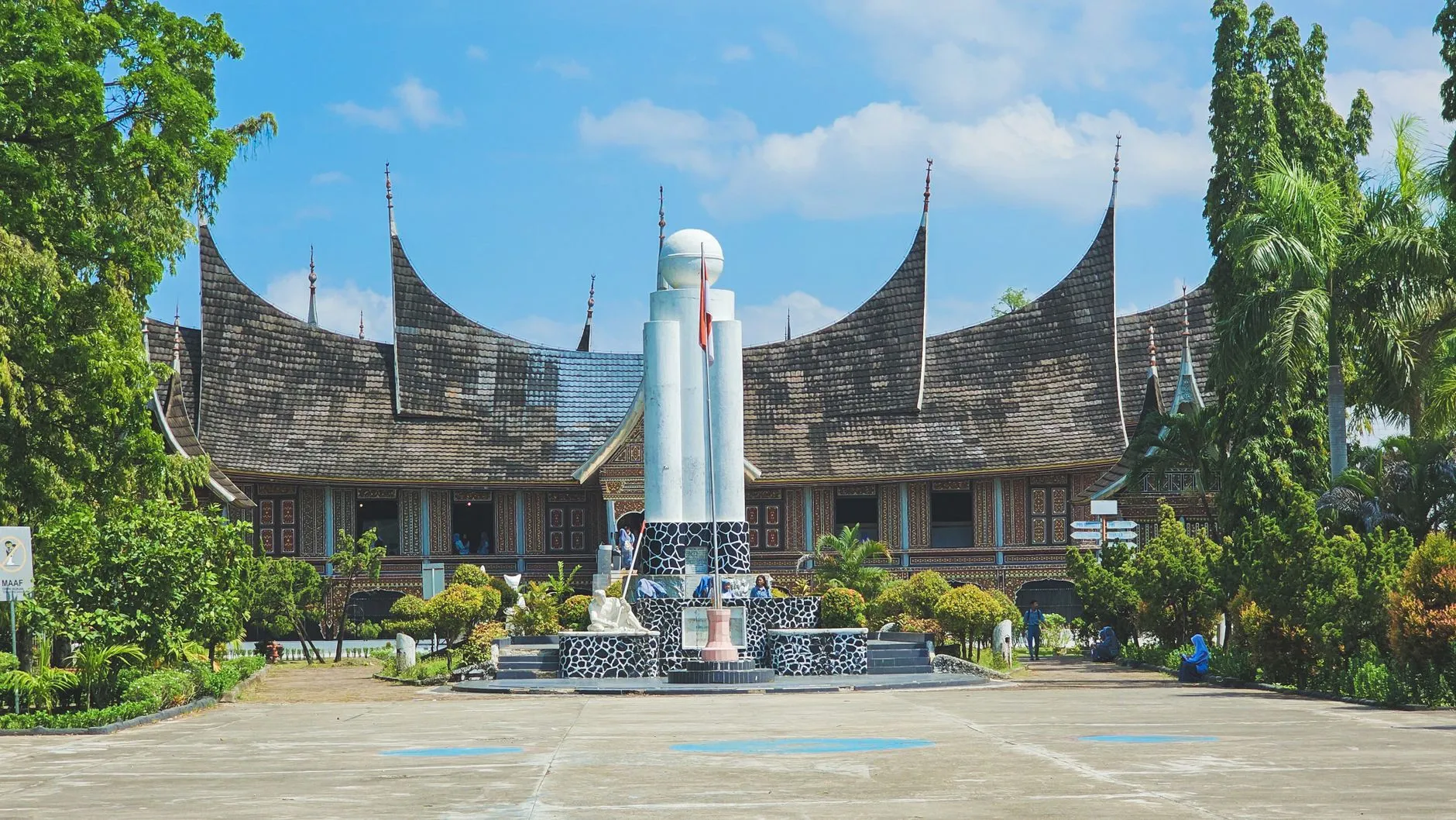 Minangkabau rooflines in Padang, where the crossing begins