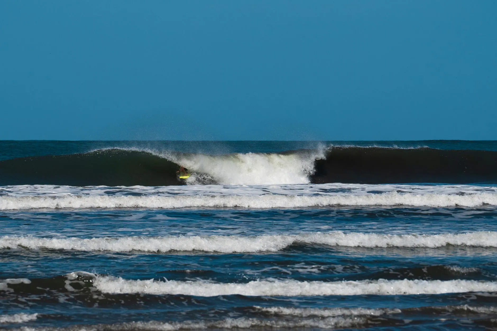 Tucked in behind the curtain on an offshore-groomed sandbar