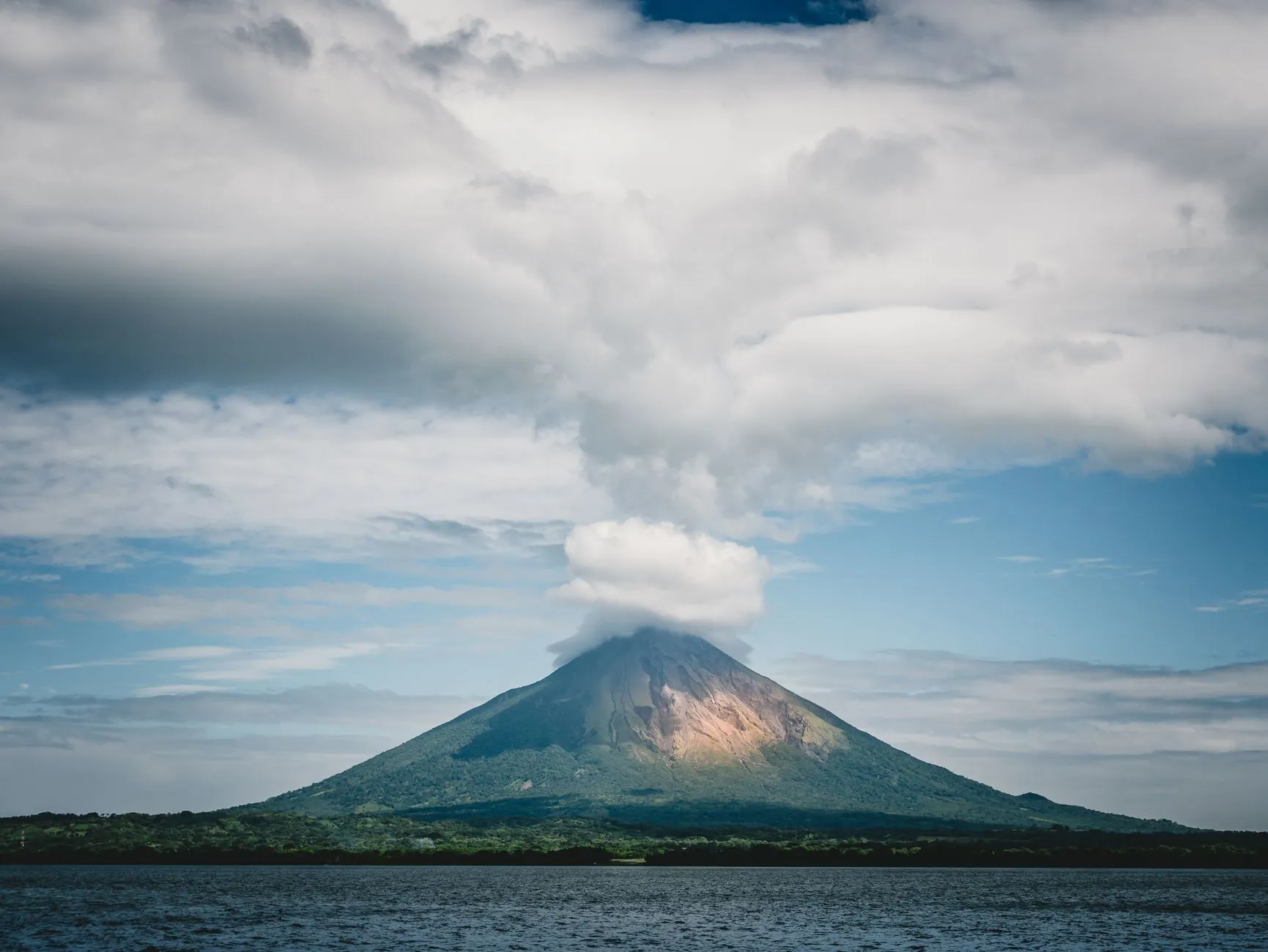 Volcán Concepción rising over Lake Nicaragua, the lake behind the offshore wind