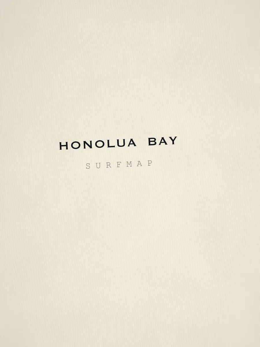 Close-up of the Honolua Bay name printed over the heart