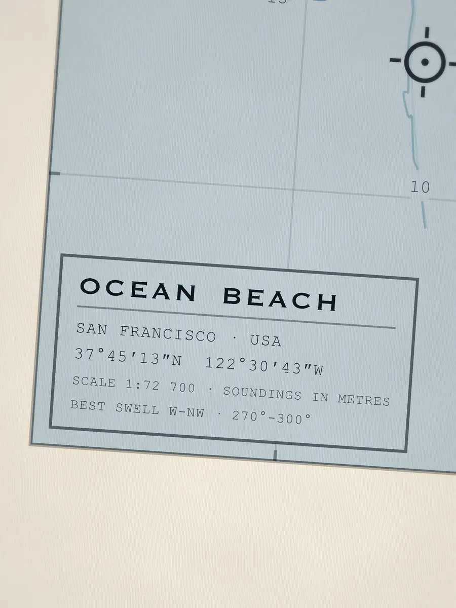 Close-up of the Ocean Beach title block: coordinates, scale and best swell
